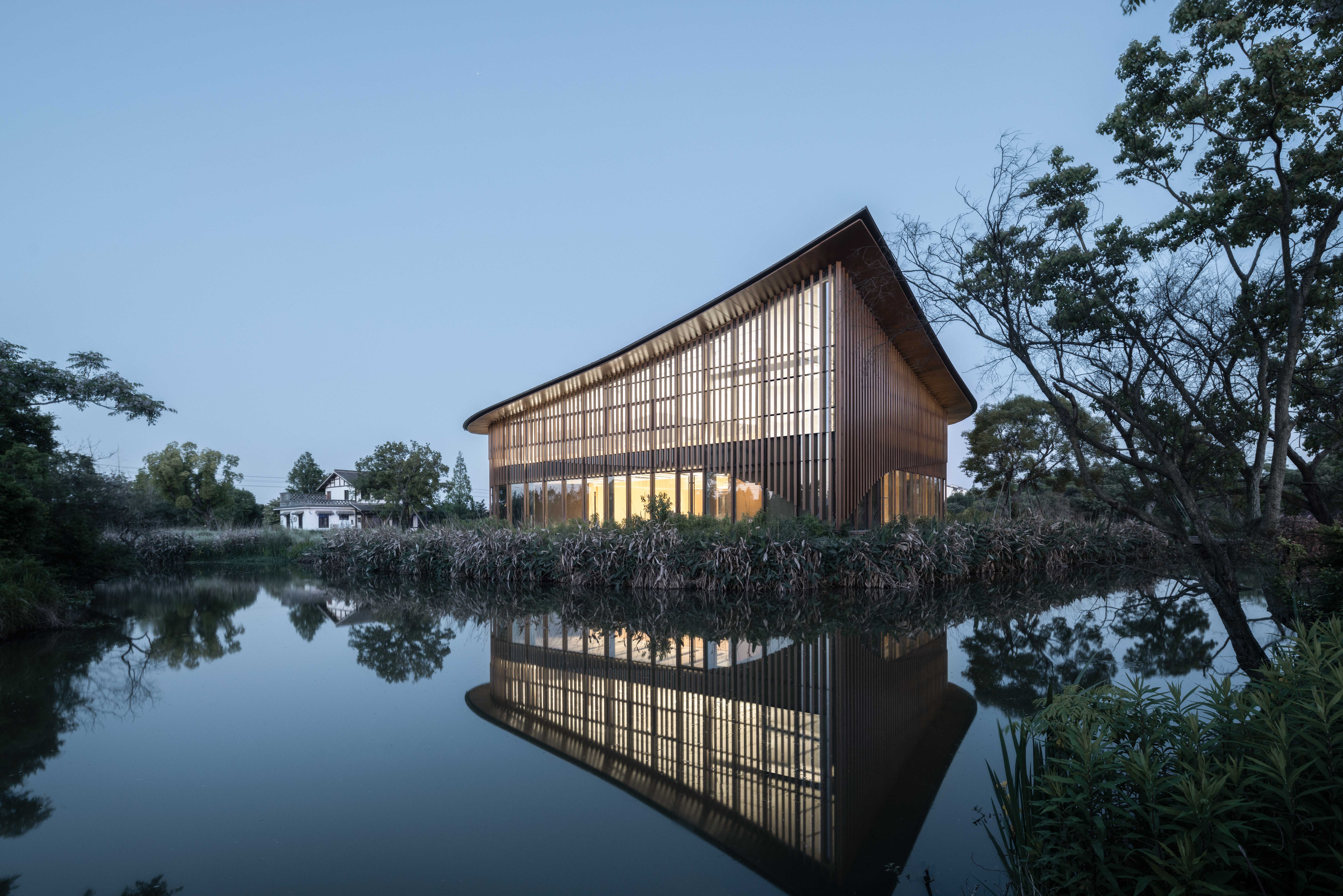 water landscapes, architectural design, urban water features, Chinese architecture, landscape integration, waterfront projects, sustainable design, natural elements in architecture, contemporary architecture, cultural spaces, Liquid landscapes