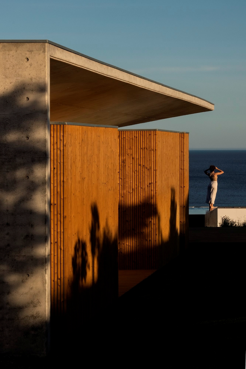 mário martins atelier's casa libre unfolds series of dualities around central patio in portugal