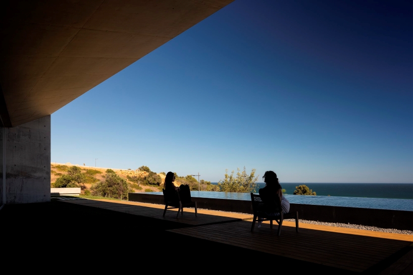 mário martins atelier's casa libre unfolds series of dualities around central patio in portugal
