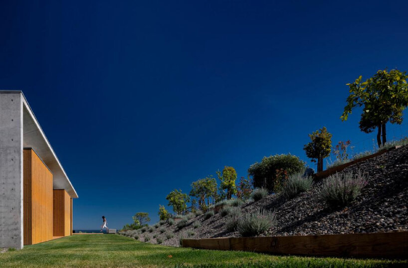 mário martins atelier's casa libre unfolds series of dualities around central patio in portugal