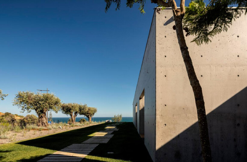 mário martins atelier's casa libre unfolds series of dualities around central patio in portugal