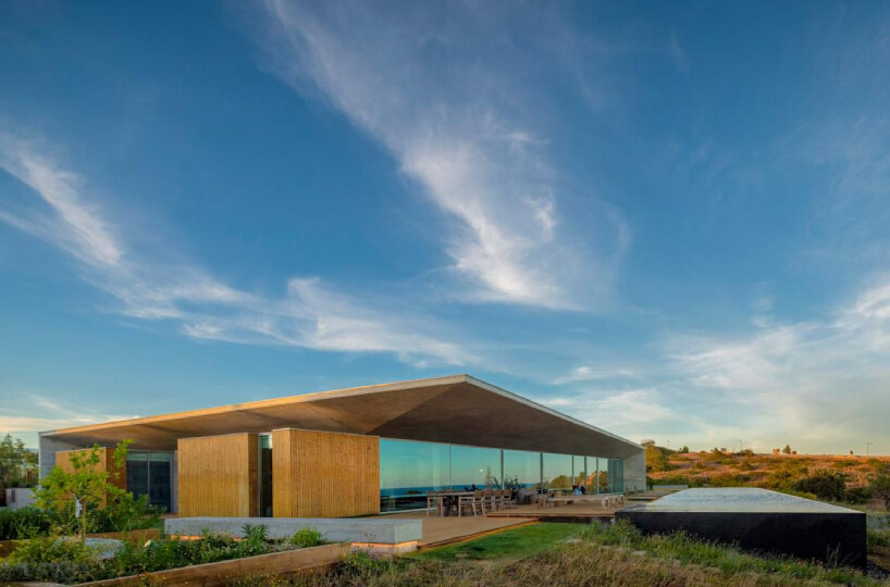 mário martins atelier's casa libre unfolds series of dualities around central patio in portugal