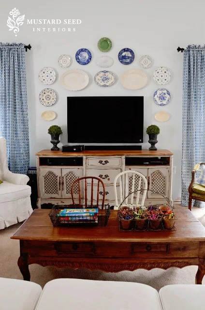 Decorating around TV with plates