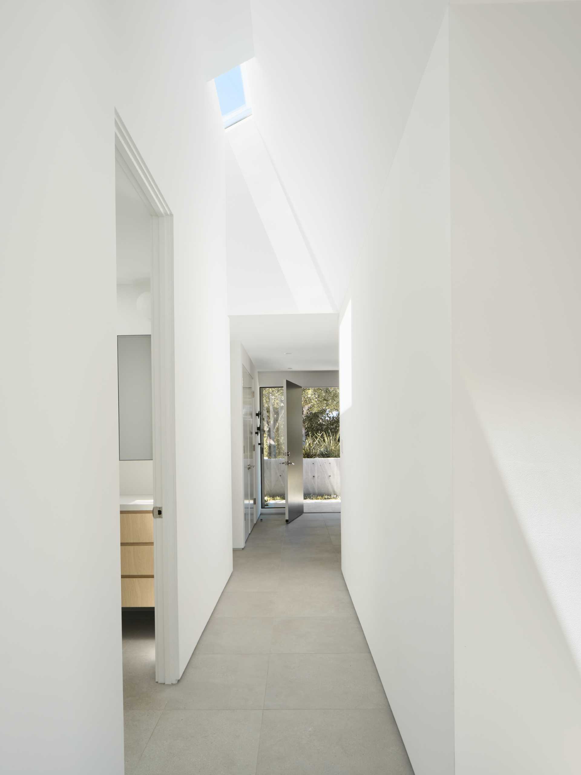 A modern hallway with a skylight.