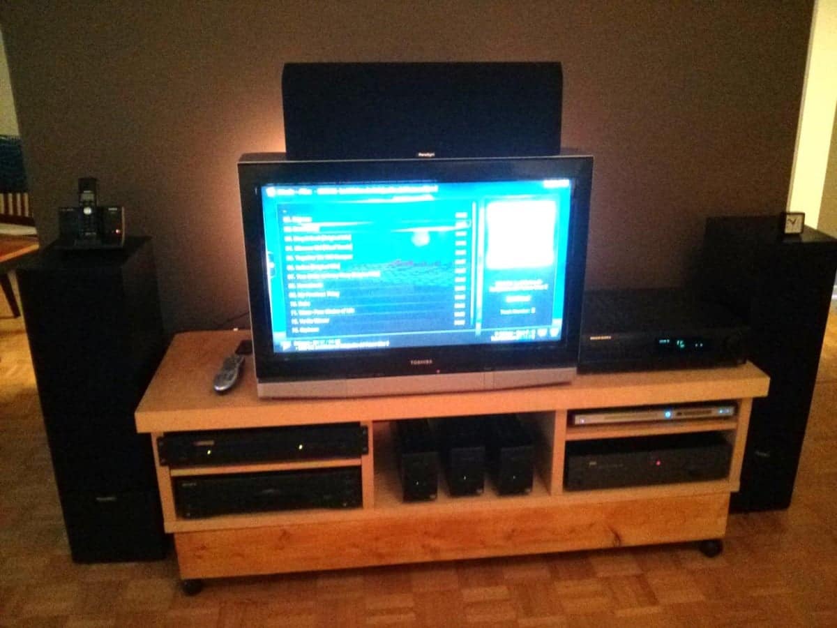 A pegboard cable management tray to keep cords off the floor