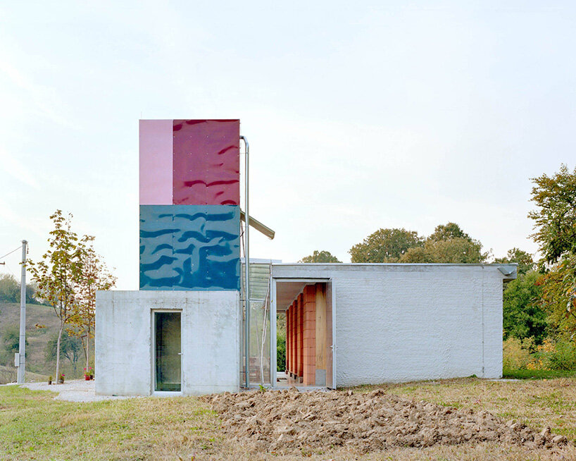 colorful aluminum panels ripple across TEN's house for women in bosnia-herzegovina