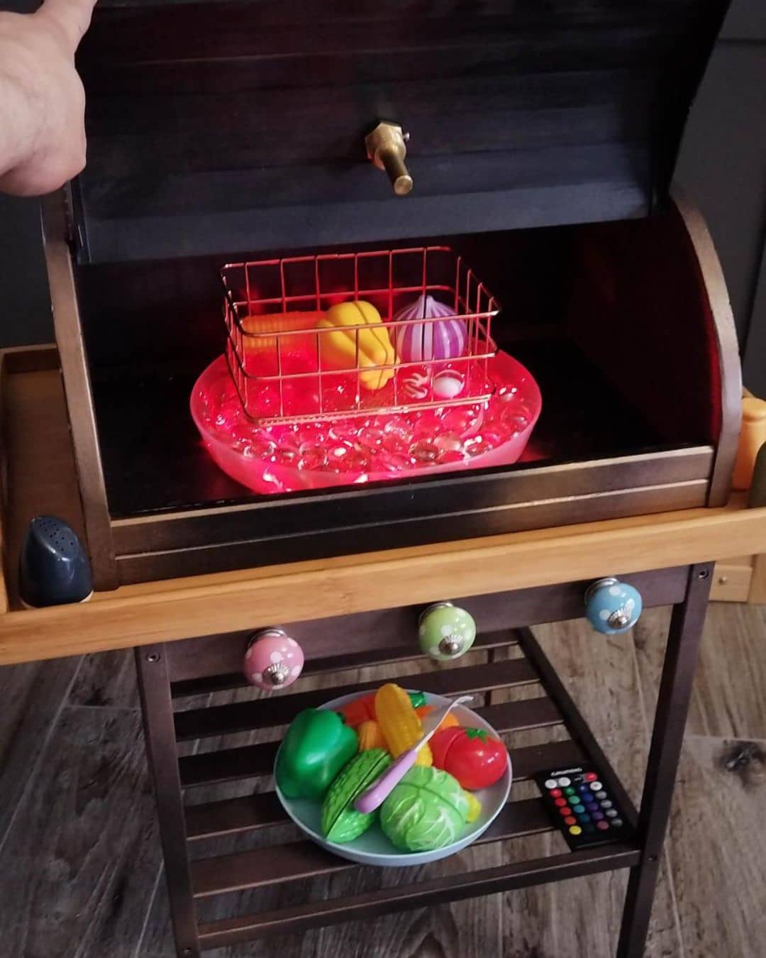 toy grill with LED lit stones for burning coal effect