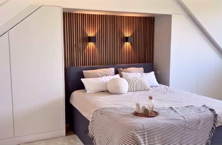Kiss Wasted Space Goodbye With This Low Ceiling Storage Hack 17 pax pitched roof wardrobe