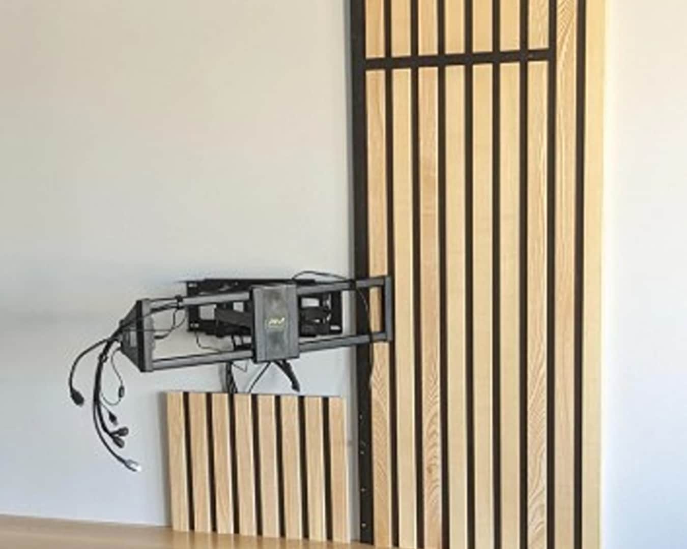 making the TV Accent wall slatted wood panel with space for wall mounted TV