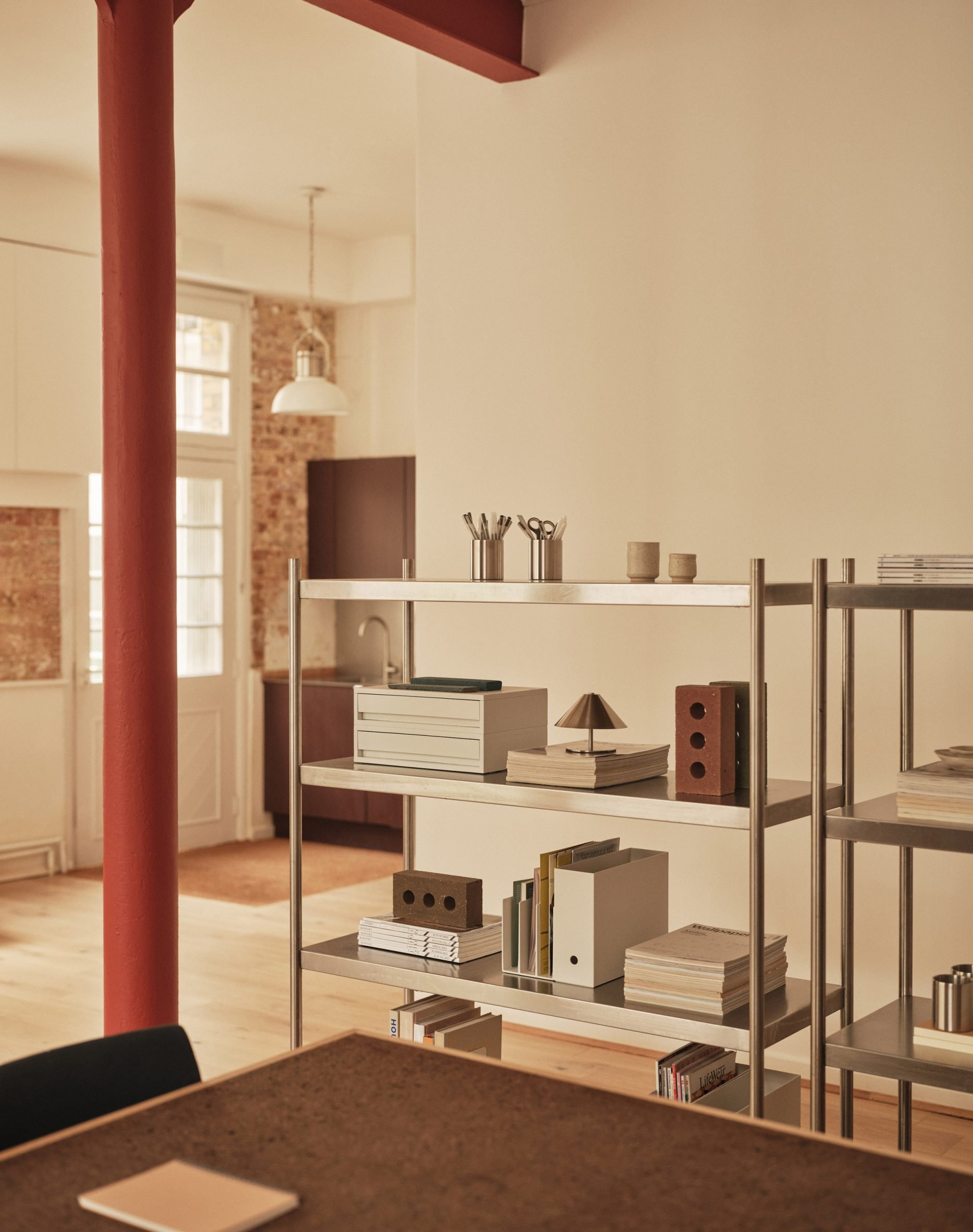 Neutral workspace with large factory windows