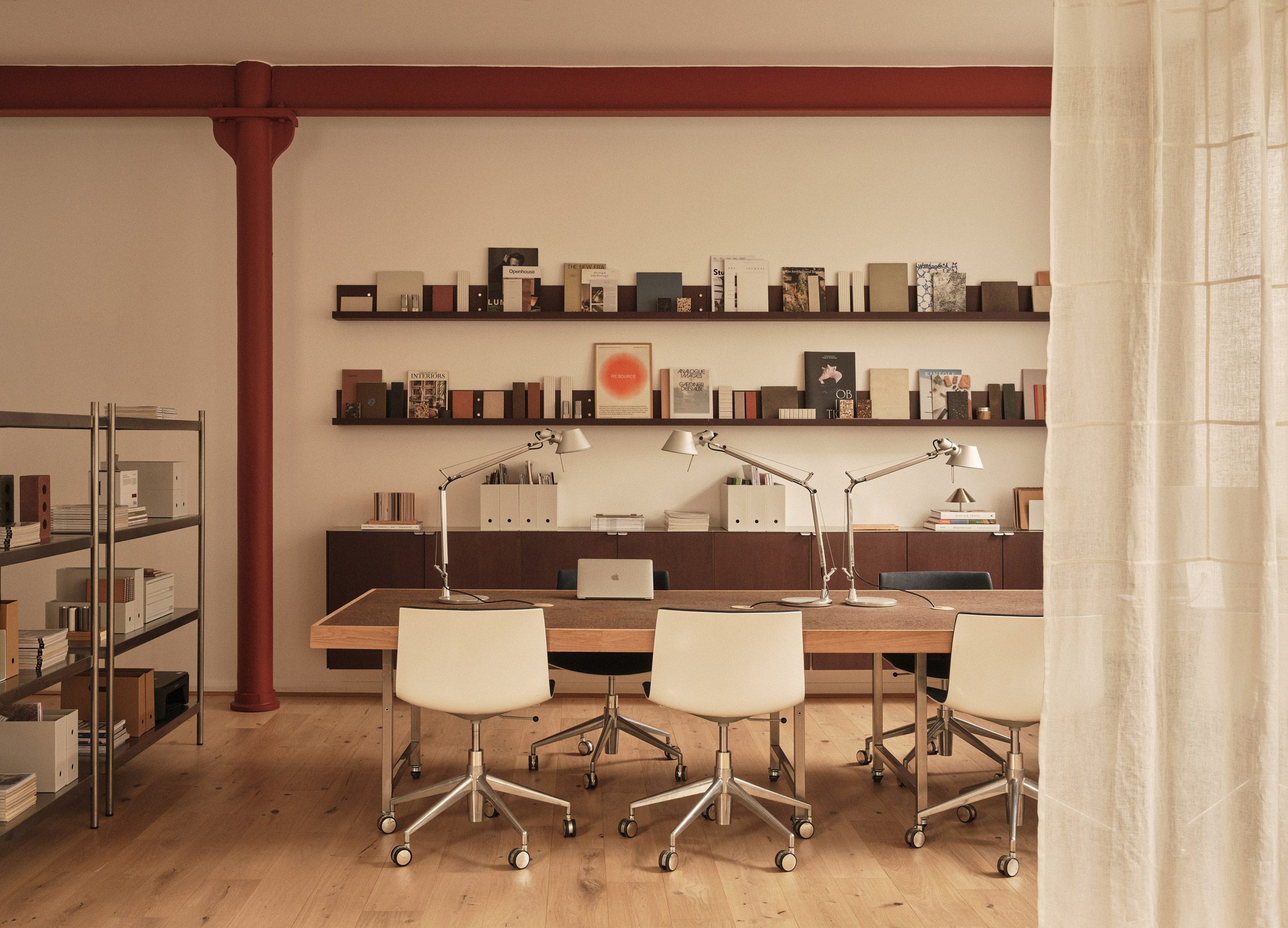 Neutral workspace with large factory windows