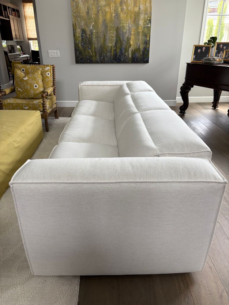 White couch in a living room.