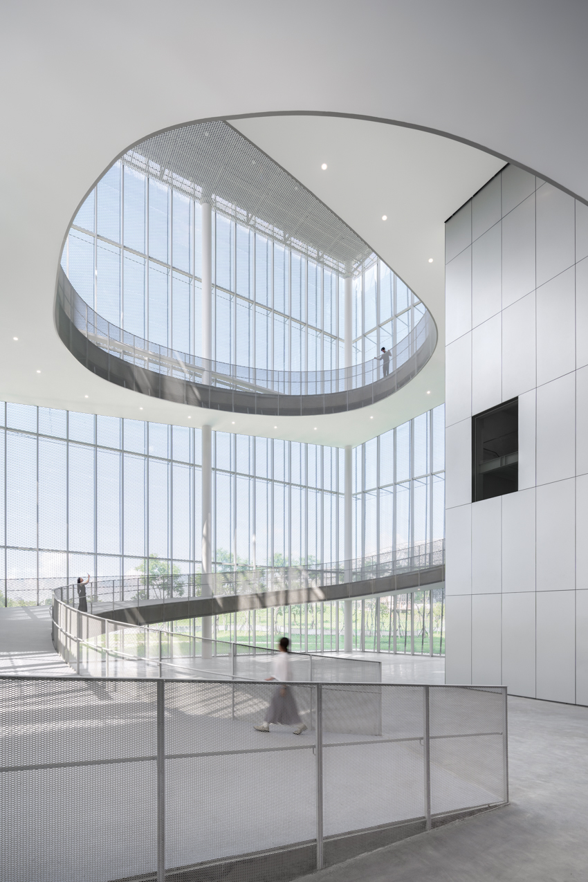 SANAA unveils taichung art museum in taiwan with translucent dual-layer metal facade