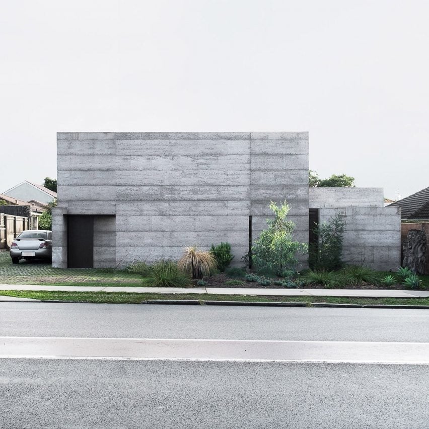 Windowless concrete house by MORQ Architects