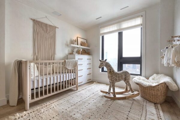 Neutral boho nursery theme and design by Decorilla