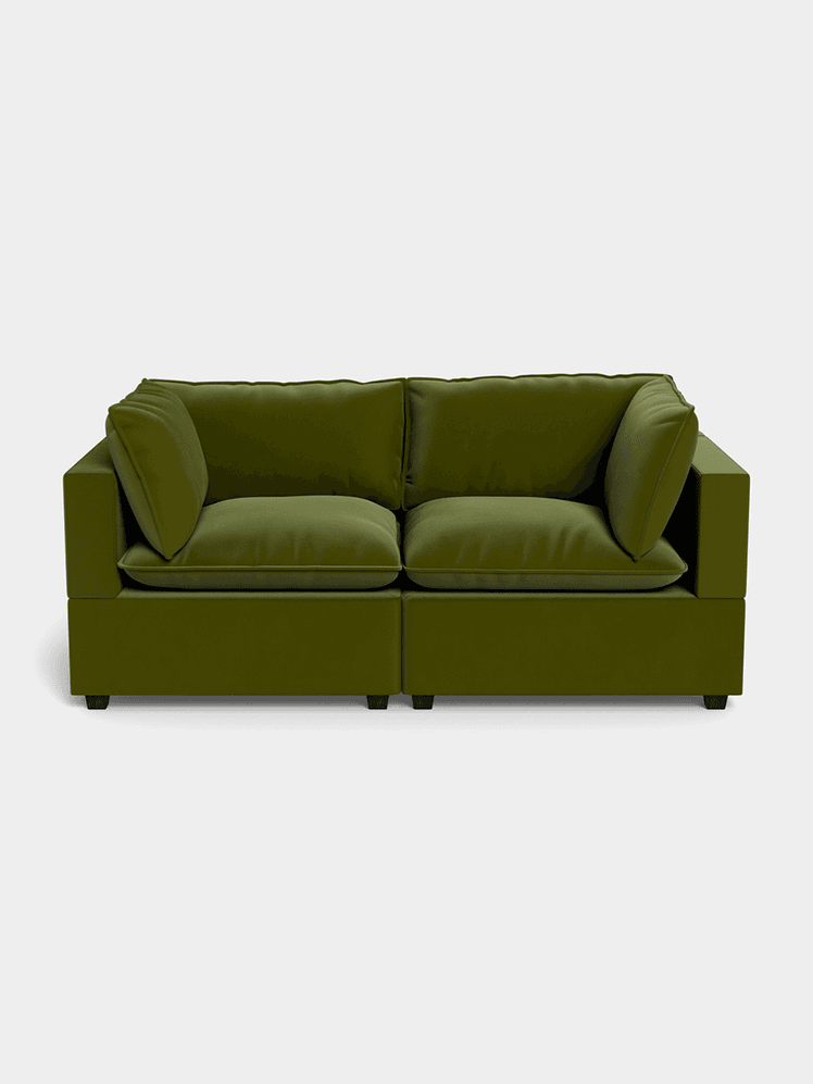 Dark green velvet two-seat loveseat couch