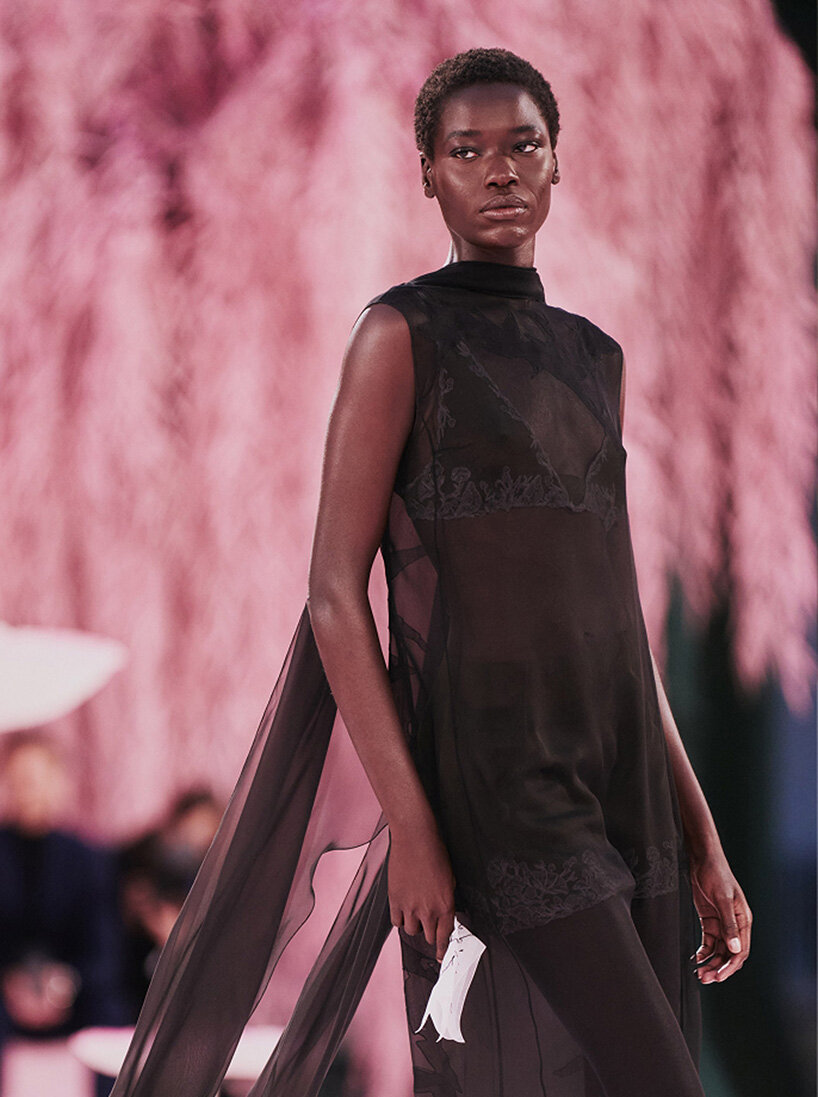 giant mushrooms populate dreamlike forest set inside the grand palais for chanel show