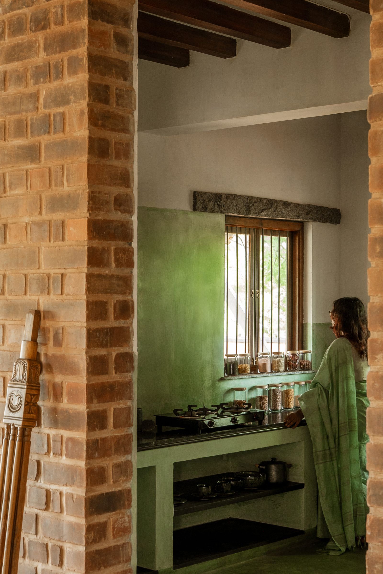 Image may contain Adult Person Brick Indoors and Interior Design