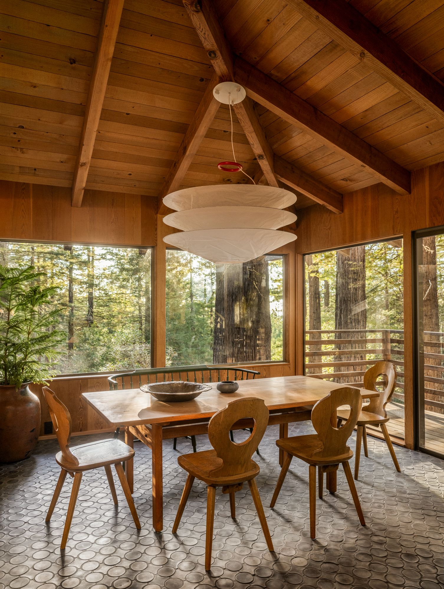 Image may contain Indoors Interior Design Dining Table Furniture Table Wood Architecture Building and Dining Room