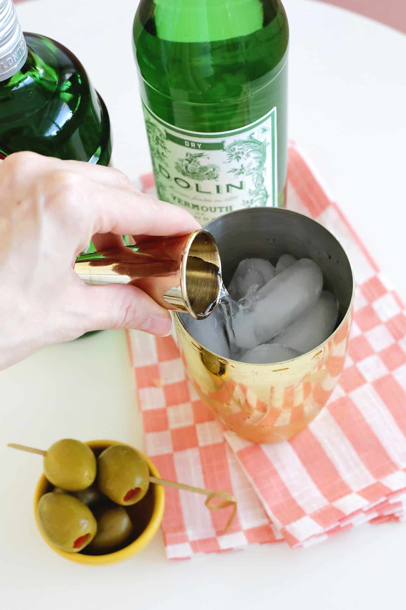 making a dirty martini